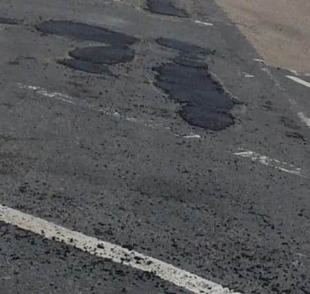 Potholes repaired in Newmarket, Louth. (Photo: Tina Smith). GbZPitNHSl3lOUG3u3aw